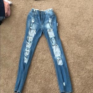 Light blue ripped jeans